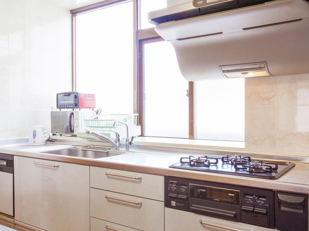 נאגו Kariyushi Condominium Resort Sea Side House מראה חיצוני תמונה